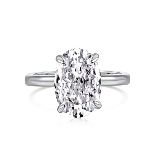Bague solitaire ovale en argent avec bande unie